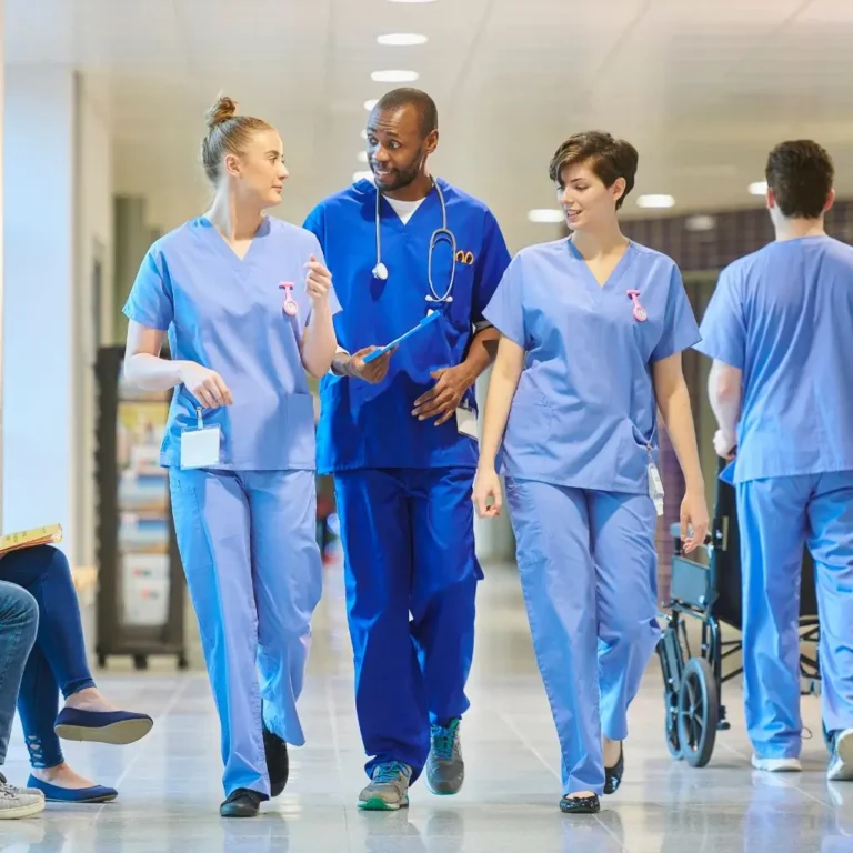 doctors walking in hospital hallway